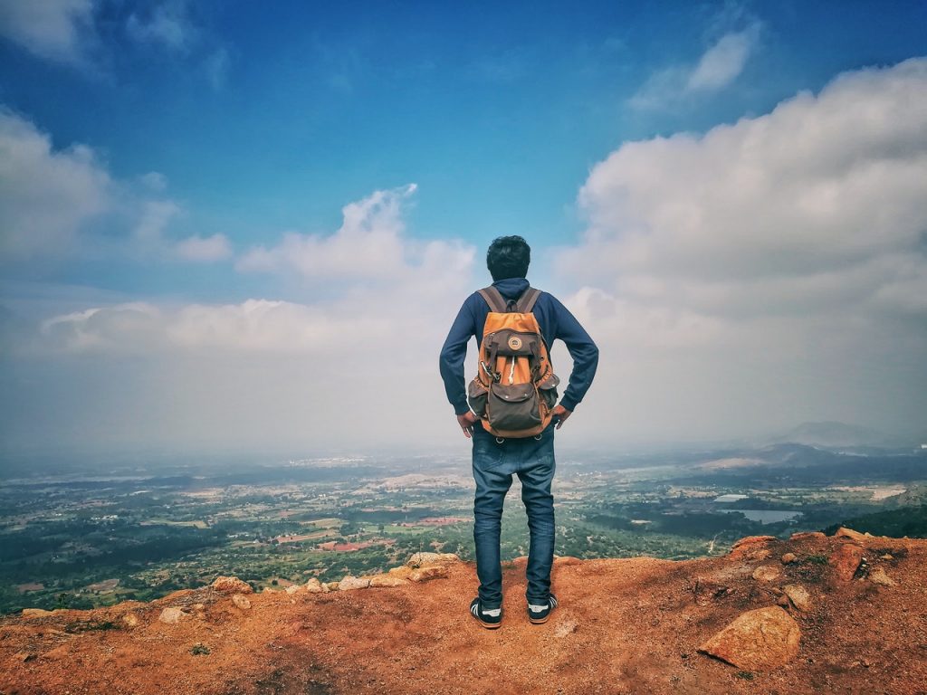 man with travel backpack
